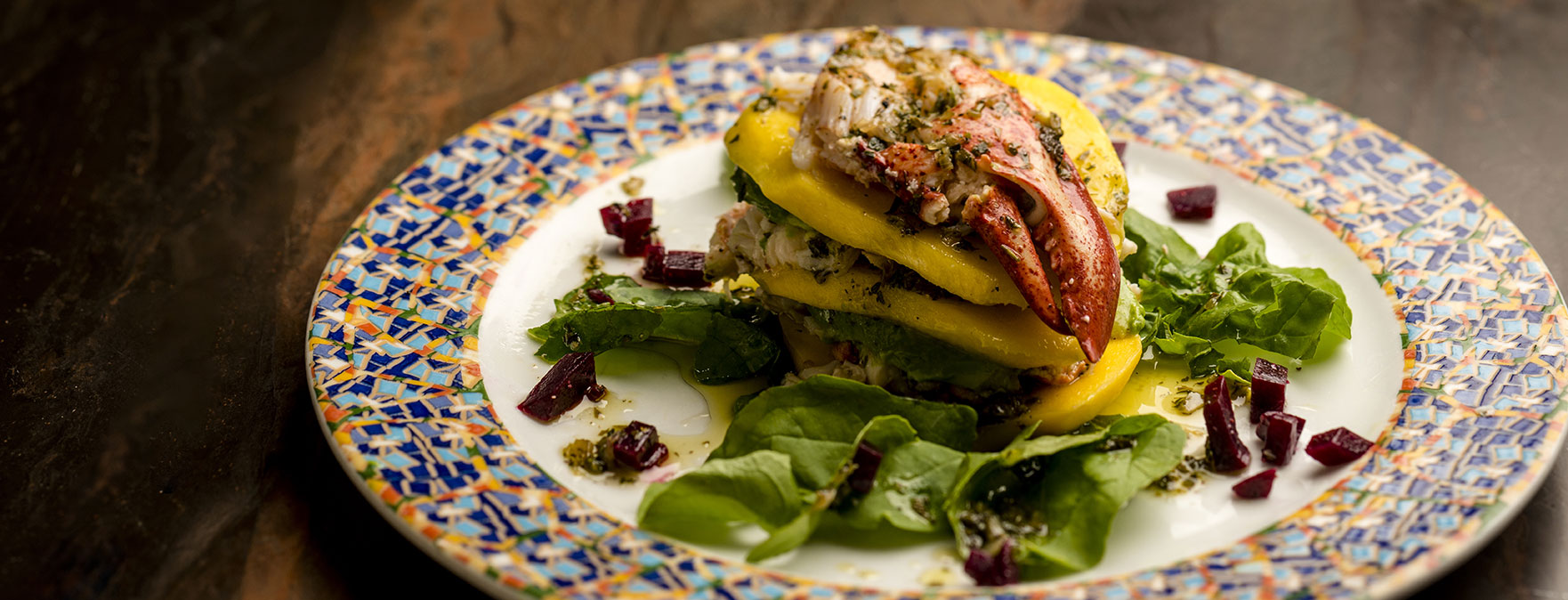 Osteria del Teatro Miami restaurant lobster over mango and spinach